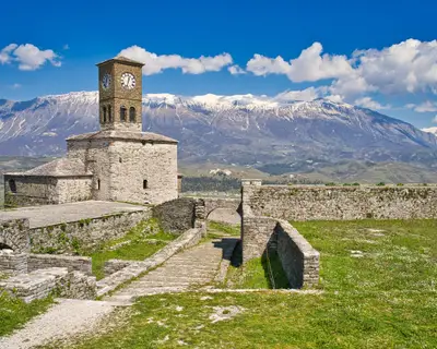 Photo take from the inside of the castle of Gjirokastra with view on the snowy mountain range