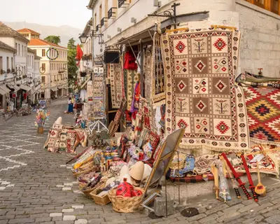Souvenir shops in old town of Gjirokaster in Albania. Old town of Gjirokaster is a World Heritage Site by UNESCO.